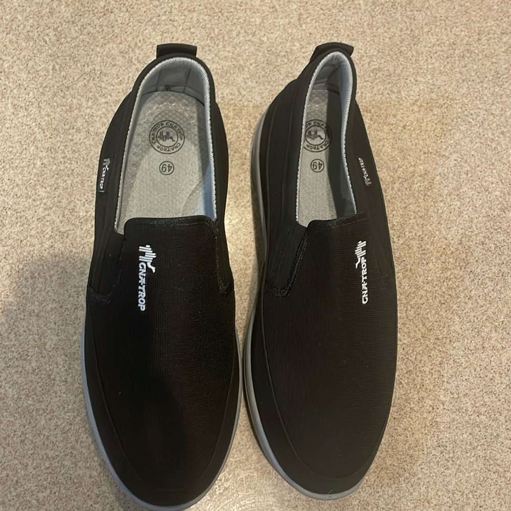 .Men’s Cnatrop brand black slip-ons Euro size 49